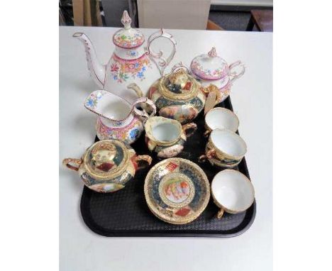 A tray of continental gilded eleven piece tea service, antique floral patterned teapot, milk jug and sugar basin  CONDITION R