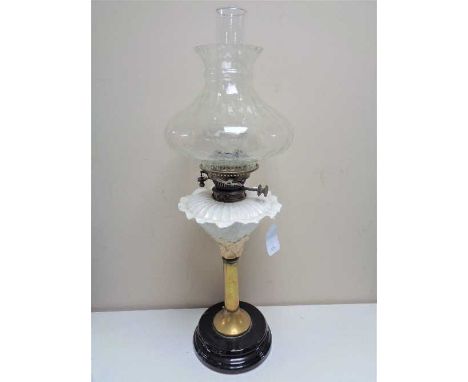 A Victorian brass and pottery Hinks number 1 oil lamp with clear glass chimney and shade 