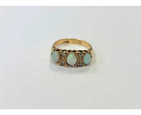 An antique 18ct gold opal and diamond ring, size K