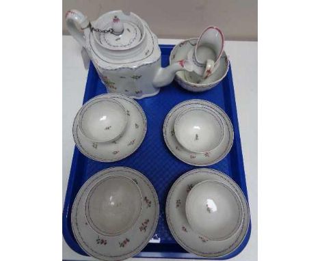 A Newhall porcelain teapot and cover, circa 1790, of commode form, puce mark to underside, height 15cm, together with similar