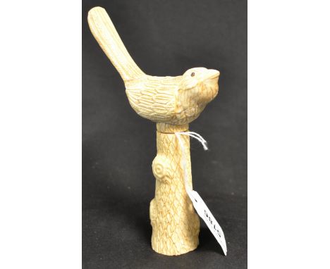 A contemporary carved bone corkscrew, the handle as a resting bird upon a removable carved trunk, brass thread, approx 17cm h