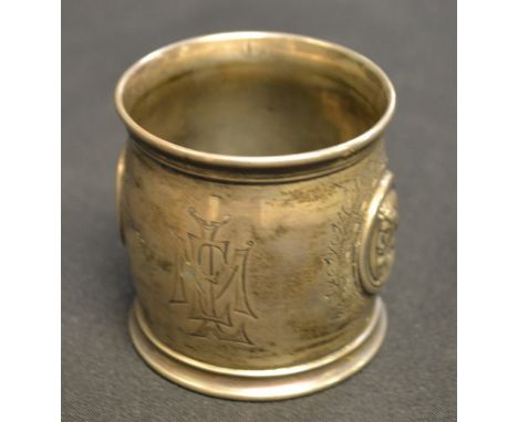 A silver coloured metal napkin ring, possibly Italian, barrelled body, cast with classical portrait panels Zeus and Hera,  en