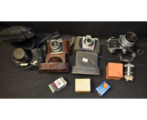 Photographic Equipment - an Ihagee Varex Exakta VX SLR camera; a Canon AV-1 SLR camera; Ensign Compur folding camera; other c