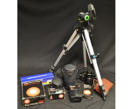 Cameras - a Canon A-1 SLR camera, lenses including 70-210mm, 50mm, 28mm filters, flash gun, silk 88 tripod; etc 