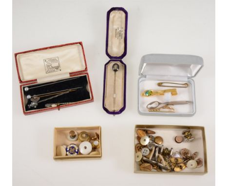 A collection of tie bars, cufflinks, a 9 carat gold stud, a memorial stick pin with black border and oval hair compartment to