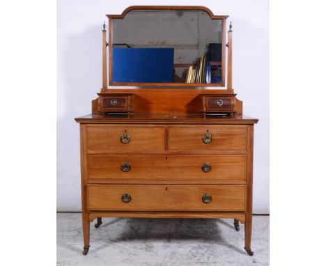 Edwardian mahogany dressing table, shaped mirror above trinket drawers, the base with a rectangular top, two short and two lo