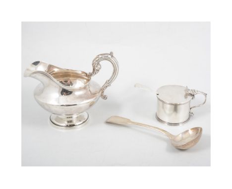 A silver pedestal milk jug, London 1837, 12cm high; a silver sauce ladle by William Eaton, London 1828; a drum mustard pot wi