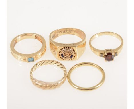 Five gold rings, a 9 carat yellow gold signet ring with a "Rotary Club" emblem to head, ring size N, approximate weight 5.5gm