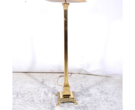 Brass Conrinthian column standard lamp, with shade, 166cm overall.