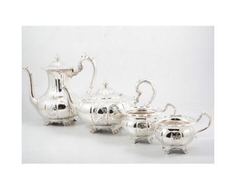 A modern silver four piece tea/coffee service by Roberts &amp; Dore, melon shaped body with alternating plain and embossed pa
