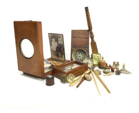 FITTED BOX CONTAINING MAGNIFYING INSTRUMENTS, including four early 20th century ivory magnifying glasses, along with an axe f