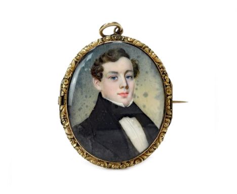 VICTORIAN PORTRAIT MINIATURE OF A GENTLEMAN, on ivory, the back with lock of hair, in a chased gilt metal pendant frame, unde