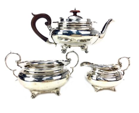 EARLY 20TH CENTURY SILVER THREE PIECE TEA SERVICE, maker JDWD, Sheffield marks, comprising teapot, sugar and cream, each of b