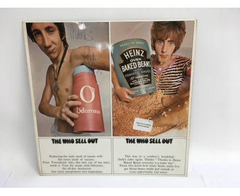 A signed copy of ‘The Who Sell Out’ LP Track 612002 complete with poster. Album sleeve bears the autographs of all four membe