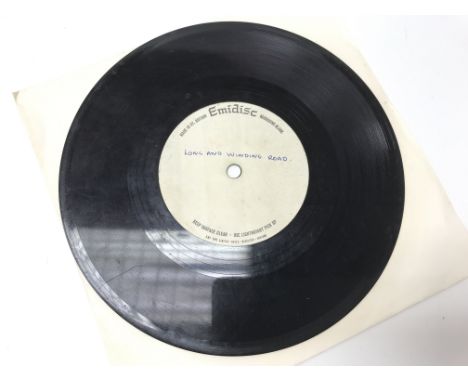 A rare 1970 one sided 7" acetate of 'The Beatles' track 'The Long and Winding Road' with Emidisc label and blue ballpoint wri