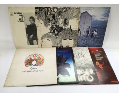 A collection of LPs by various artists including The Beatles, Queen, Thin Lizzy, Bob Dylan and others.