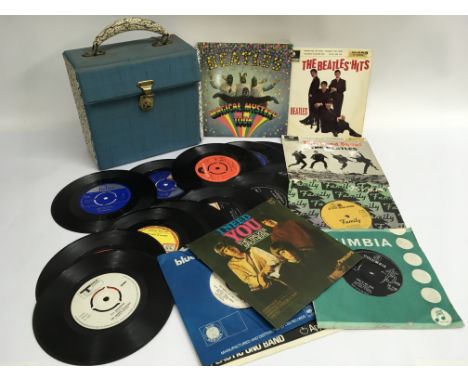A record box containing 7 inch singles and EPs by various artists from the 1960s and 70s including a ‘Magical Mystery Tour’ E