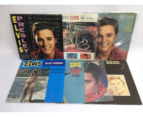 Seven Elvis Presley LPs including interview discs.