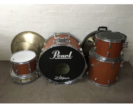 A Pearl drumkit comprising a kick drum, two rack toms, snare and a floor tom. Comes supplied with flight cases, Zildjian cymb