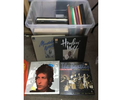 A collection of record box size CD box sets by various artists including The Beatles, Bob Dylan, Crosby, Stills & Nash and ot