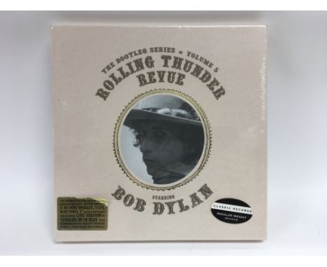 A sealed Bob Dylan three LP set 'Rolling Thunder Revue, Volume 5'.