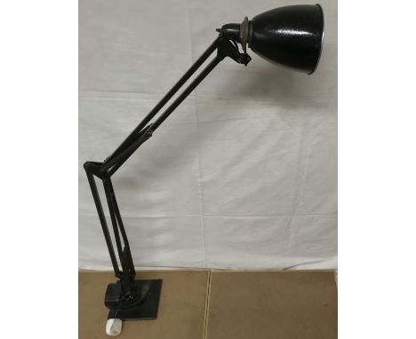 A large black Anglepoise adjustable lamp, bearing mark. Approx 116cm, fully extended
