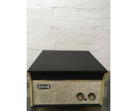 A vintage Dansette portable record player in cream case