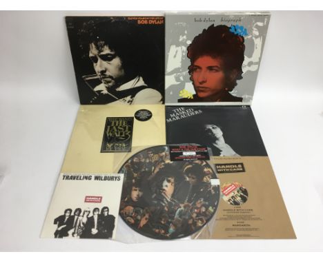 A collection of Bob Dylan and related LPs and singles including an Australian import 'Eleven Years In The Life Of', 'Biograph