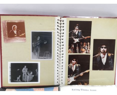 Three binders of original photos of Bob Dylan on stage in the 1960s, 70s and 80s plus an official programme for The Picnic, 1