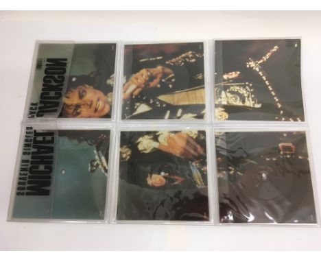 A small collection of Michael Jackson and Janet Jackson picture discs.