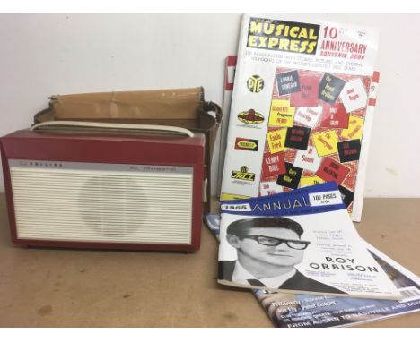A Philips transistor record player with booklet and carry case plus circa 1960s magazines including NME.