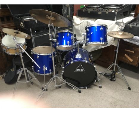 A Black Rat drumkit in blue comprising kick drum, two rack toms, a 14inch snare, floor tom, hi hats with cowbell, crash and r