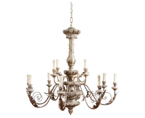 ITALIAN STYLE TWELVE LIGHT WOOD AND TOLE CHANDELIER MODERN the silver painted foliate carved and knopped central column issui