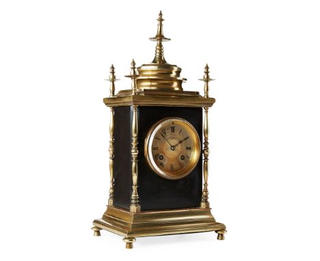 INDIAN SLATE AND BRASS-MOUNTED MANTEL CLOCK 19TH CENTURY with a moulded finial, over a brass dial with a Roman numeral chapte