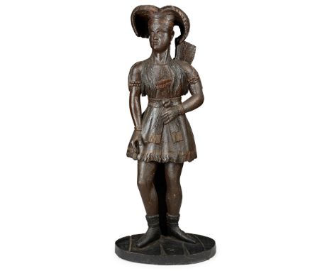 CARVED AND STAINED HARDWOOD TOBACCO FIGURE LATE 18TH CENTURY/ EARLY 19TH CENTURY depicted standing wearing a tobacco leaf hea