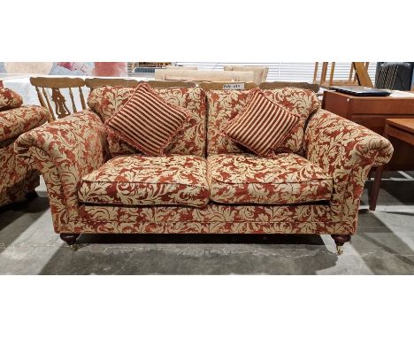 20th century red damask two-seater sofa on turned supports and castors&nbsp;