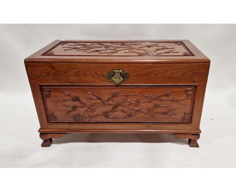 20th century camphorwood Chinese chest with trays to inside, carved panel top and sides, on shaped feet, 61 h x 102cm wide x 