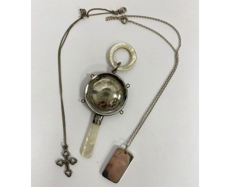 Silver and mother-of-pearl baby rattle, a silver ingot pendant on chain, 33.5g and a silver-coloured cross&nbsp;on chain (3)&