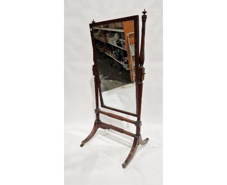 Mahogany cheval robing mirror, the rectangular plate with ebonised borders, on reeded uprights, cross stretcher, reeded splay