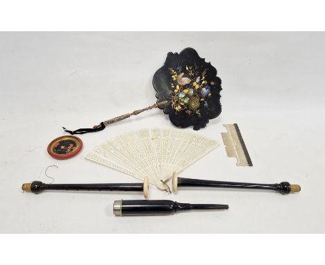 Bone brise fan, a bone comb with silver-coloured metal mounted handle (broken), a 19th century ebonised papier mache face shi