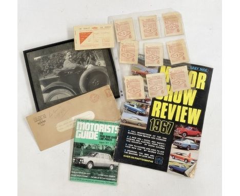 Items relating to motoring and rationing, a motor fuel ration book numbered LH 509117, the guarantee form of a Morris car dat