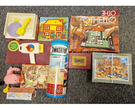 Two boxes of children's games and puzzles to include Snow White block puzzle, The Original Tinkertoy Giant Engineer, Beryl 'T