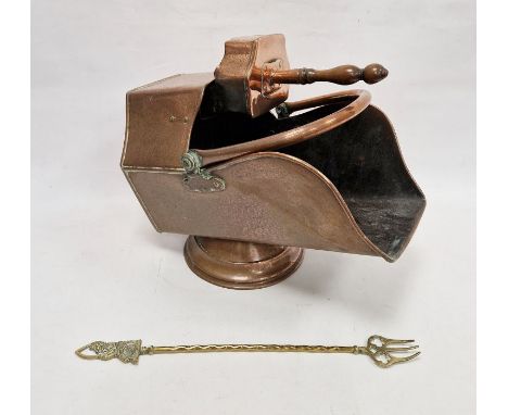 Copper coal scuttle, wedge-shaped, with angular shaped scoop with turned wood handle,&nbsp;on circular foot and a brass toast
