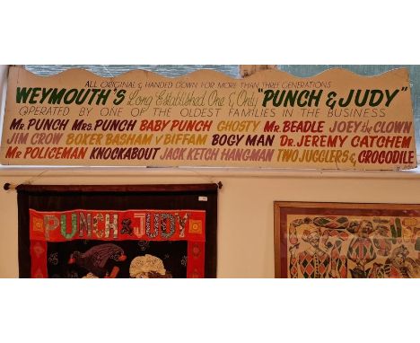 Georges Biles' painted signboard for 'Weymouth's Long Established One and Only Punch and Judy' and a 'Next Show' clock face b