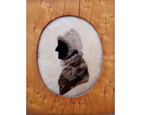 Pair of Regency portrait silhouette miniatures in bird's eye maple frames