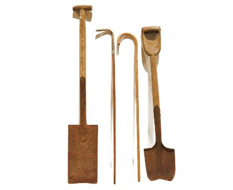 Vintage spade and another, and two walking sticks (4)