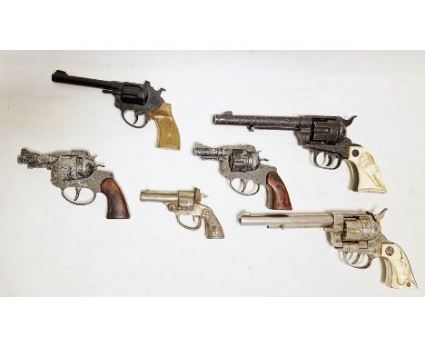 Small quantity of cap guns to include Hubley Mfg. co. cowboy revolver, Crescent toy company Rustler 45, two S - agent revolve