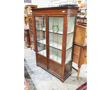 Edwardian mahogany glazed display cabinet, leaded glazed stained glass doors, bracket feetCondition ReportSurface scratches, 