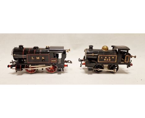 Hornby '0' gauge clockwork 0-4-0 tank black locomotive marked LMS no16045 in gilt&nbsp;together with a Hornby '0' gauge clock
