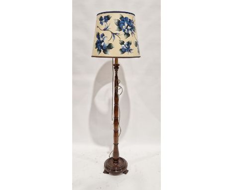 Turned wooden standard lamp with cream shade with blue painted flowers&nbsp;